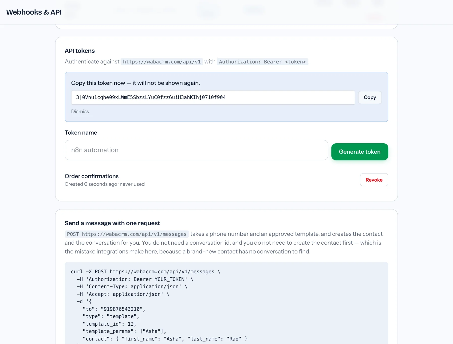API tokens card on the Webhooks & API screen with a new token shown once with a Copy button beside it and Dismiss below, a token row reading never used with a Revoke button, and the one-request send example beneath