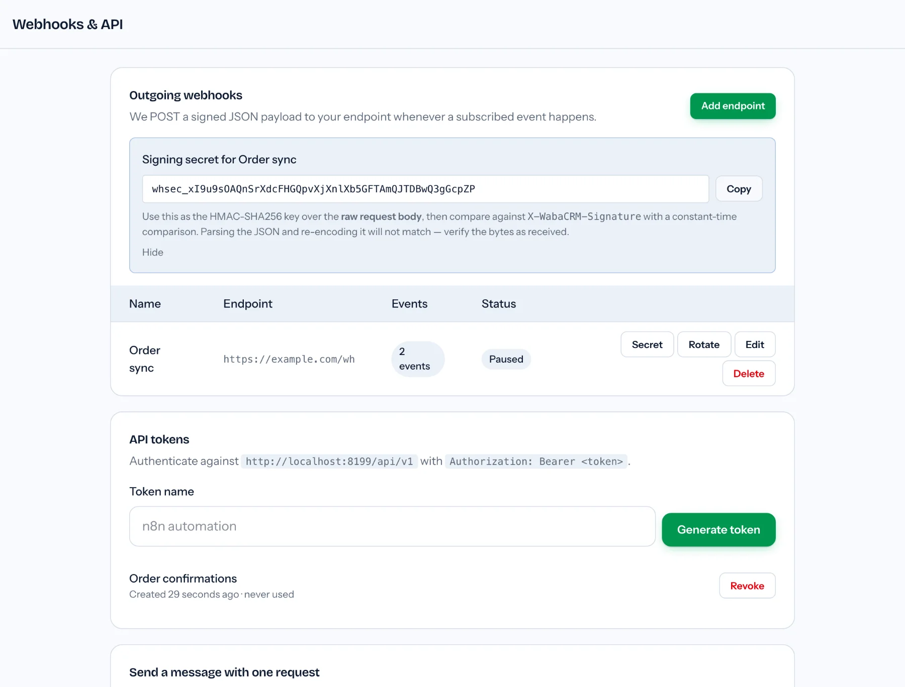 Webhooks & API screen with the Add endpoint button at the top, the signing secret panel for the Order sync endpoint showing a demo secret with Copy and Hide, and below it an endpoint row marked Paused with Secret, Rotate, Edit and Delete buttons